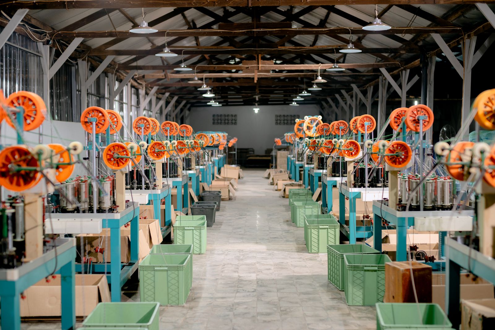 Interior of the Sneha Vinyl manufacturing hall with industrial machinery